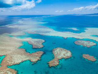 Beautiful drone aerial view of Mayotte lagoon, coral reef and island