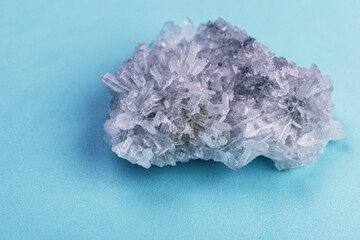 Crystal  on blue background  with quartz clusters for recreation and meditation. Crystals for...