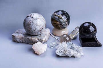 Crystal Sphere on grey background  with quartz clusters for recreation and meditation. Crystals for esoteric  practice.