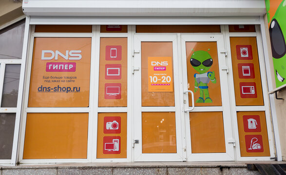 Russia, Vladivostok, August 22, 2021. Store of DNS Company. DNS is one of the largest retailers of computer related goods and home appliance in Russia. Entrance to store. Stores of Russia.