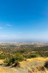 Fototapeta premium Beautiful view of the open spaces of the mountains of Cyprus with green trees