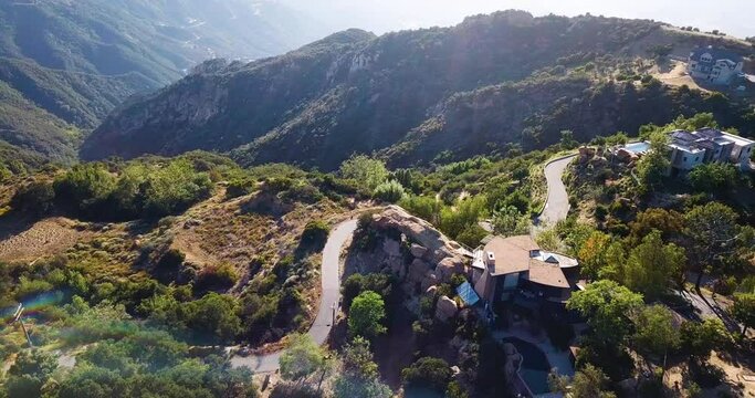 Malibu mountains and rare residential houses, Beautiful sunny day in California. Aerial drone footage