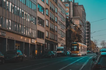 Foto op Plexiglas Spring in Brussels, Kingdom of Belgium. Yellow tram and few cars on the street. Belgian road. © depiano