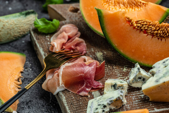 appetizer with sweet melon and ham, dorblu stilton dairy product, blue cheese roquefort gorgonzola, roquefort, cambozola, Food recipe background