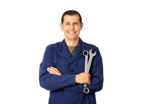 Image of a male mechanic standing confidently while holding two spanner with white background