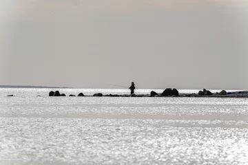 Foto op Aluminium Person fishing on the outer reef © LeonHansenPhoto