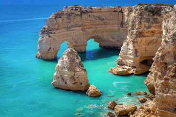 Beautiful view of sea arch in Praia da Marinha beach in Algarve, Portugal.