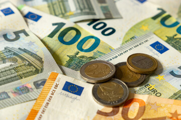 Euro banknotes. table covered with banknotes.