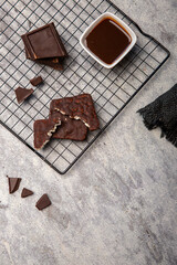  chocolate dipped rice cookies with gray background texture