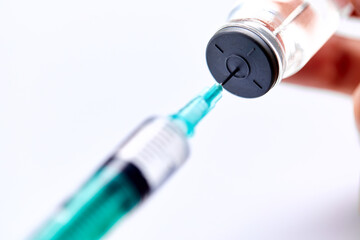  Vaccine in vial with syringe