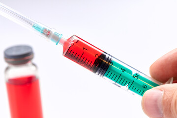  Vaccine in vial with syringe
