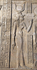 Carved wall relief of the goddess Isis, Komombo Egypt
