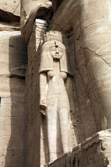 Statue of Queen Nefertari beside the statute of Ramses II, Abu Simbel Egypt
