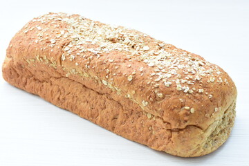 Large wholemeal oatmeal bread, sweetened with natural panela