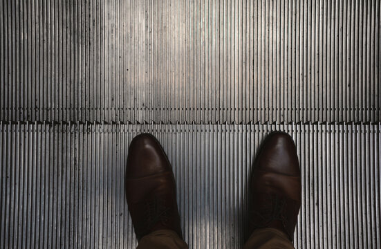 A man on the escalator