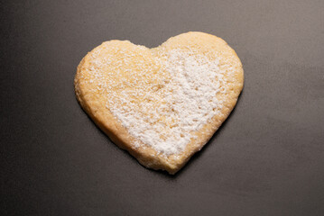 Shortbread in the shape of a heart isolated on white background.