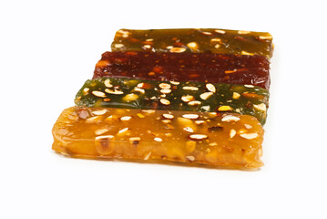 Turkish traditional delight with nuts isolated on white background.