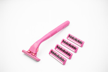 Pink razor shaver isolated on white background. image of beautiful pink shaver razor. copy space for text.