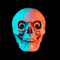 Human skull with evil smile and orange and teal hues. Halloween or Santa Muerte conceptual...