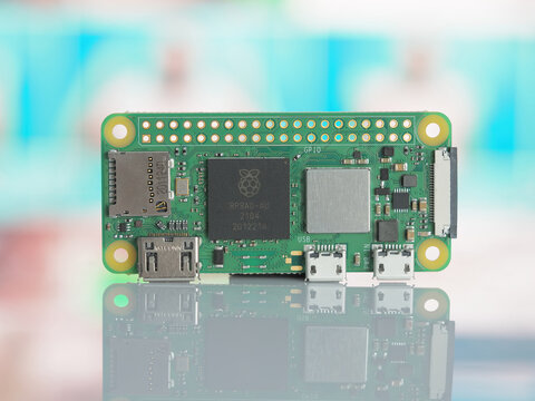 Galati, ROMANIA - April 04, 2022: Close-up of a new Raspberry Pi Zero 2 W with the new RP3A0 isolated on blurry background