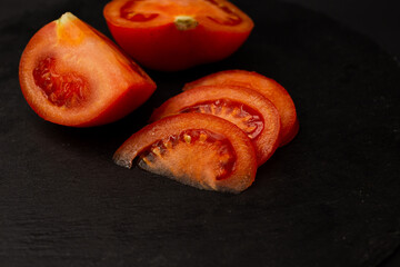 Tomato on a black background