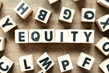 Alphabet letter block in word equity with another block on wood background