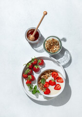 breakfast with granola and strawberries - 496886458