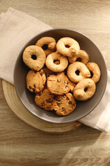 Plate of sugar cookies and chocolate chip cookies on the table. Flat lay.