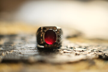 Silver ring with precious .silver and semiprecious stones. Finger decoration with gems