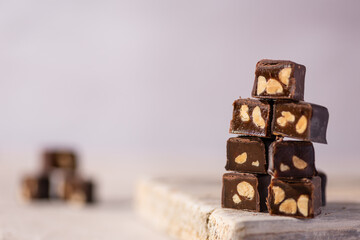 Selective focus macro chocolate cream homemade candies with peanuts and salt   