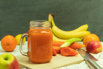 Fresh and healthy juice from carrots and leeks