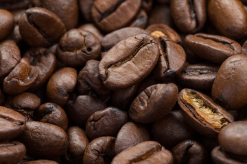 Naklejka premium extreme close-up of coffee beans 