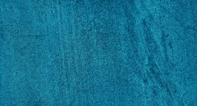 bright blue slate background or texture. close up ceramic stone tile texture use as background with blank space for design. vintage distressed smooth texture and bright blue color paint.