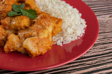 Meal - Chicken breast with pieces of mozzarella cheese and white rice