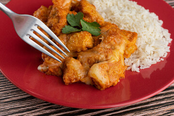 Meal - Chicken breast with pieces of mozzarella cheese and white rice