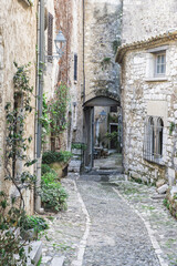 Narrow Street through the medieval city of Saint Paul de Vence, Alpes-Maritimes Department, Cote d’Azur, France