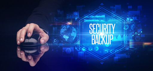 hand holding wireless peripheral, cyber security concept