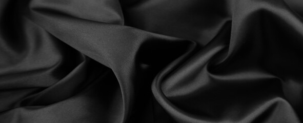 Naklejka na ściany i meble Closeup of rippled black silk fabric