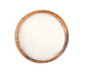 Top view of a wooden bowl with white sugar on a white background.