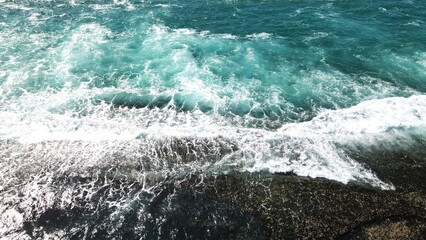 Aerial view of ocean waves on beautiful Brazilian beach