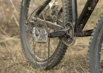 a mountain bike wheel in close-up, the chain flew off