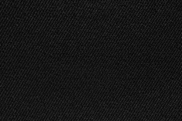 Textured background with a black fabric pattern