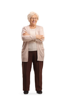Elderly woman smiling and posing with crossed arms