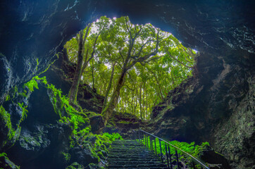 Steep staircase leading to gruta das torres cave at Pico island, Azores, Portugal - obrazy, fototapety, plakaty