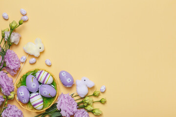 Obraz na płótnie Canvas Easter greeting card. Purple flowers eggs in a basket on a yellow background with copy space.