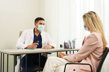 Doctor and female patient during consultation