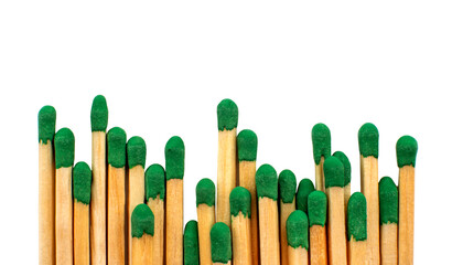 Green matches on a white background. Isolate of matches for kindling a fire.