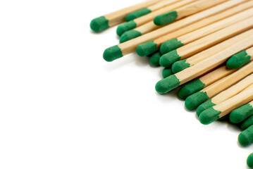 Green matches on a white background. Isolate of matches for kindling a fire.