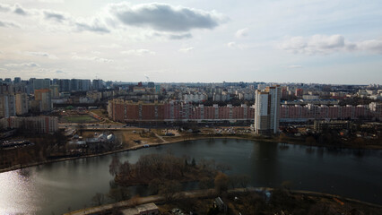 Obraz premium City block near the river. Multi-story houses. Water city system. Aerial photography.