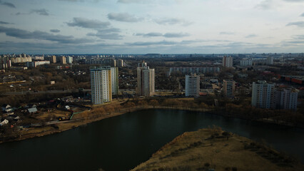 Obraz premium City block near the river. Multi-story houses. Water city system. Aerial photography.
